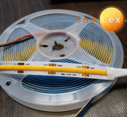 ریسه نواری COB برند سانلکس 12 ولت تراکم 480 پشت چسب دار 5 متری عرض 10 میلی متر آفتابی